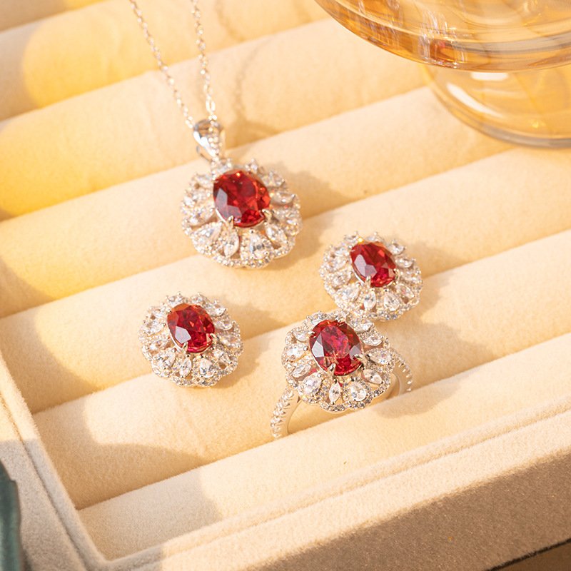 2-carat pigeon blood red grown ruby oval ring set